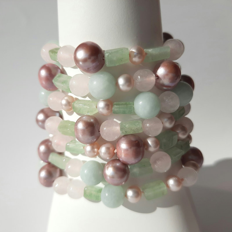 Rosegarden bracelet necklace multi wear jewel three or two row layered or long lariat necklace from gemstone beads with sterling silver toggle closure rose quartz soft green jade soft pink pearls 112 centimeters € 195,- Daphne Meesters Jewellery Designer Goldsmith The Hague Netherlands