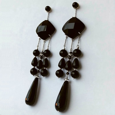 Onyx ear studs and sterling silver with onyx ear jackets Daphne Meesters Jewellery Designer Goldsmith The Hague Netherlands
