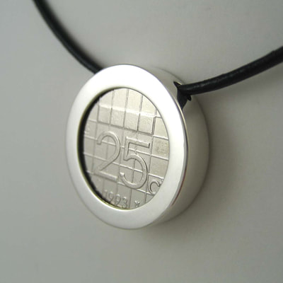 25 cents coin bezel simple modern pendant sterling silver shiny finish on black leather cord 25th birthday present Daphne Meesters Jewellery Designer Goldsmith The Hague Netherlands