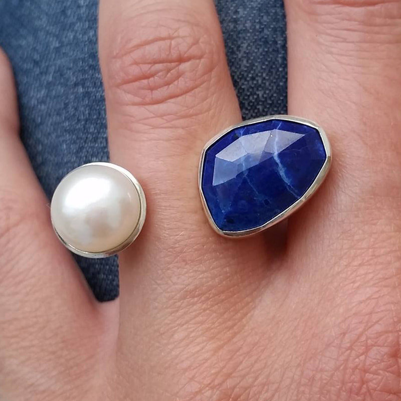 Floating clouds ring sterling silver with irregular facetted blue lapis lazuli gemstone and a white pearl size 16.5 millimeters € 265,- Daphne Meesters Jewellery Designer Goldsmith The Hague Netherlands