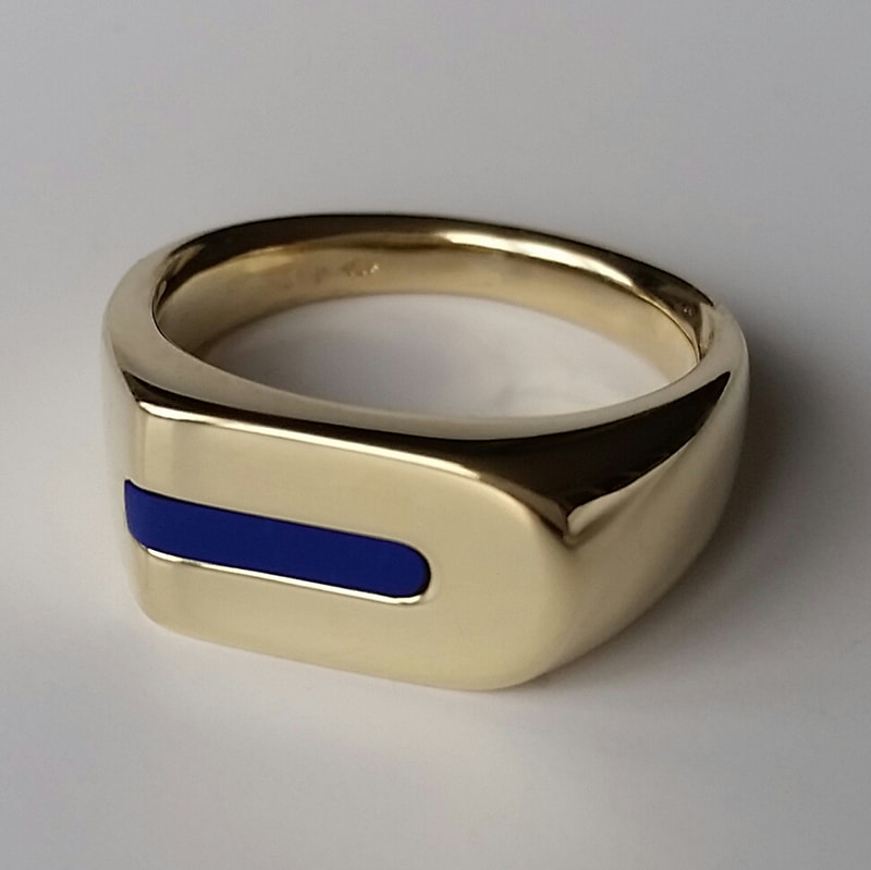 Lapis mens signet ring  remake of a long cherished model in 14 carat yellow gold with a lapis lazuli stone  Daphne Meesters Jewellery Designer Goldsmith The Hague Netherlands